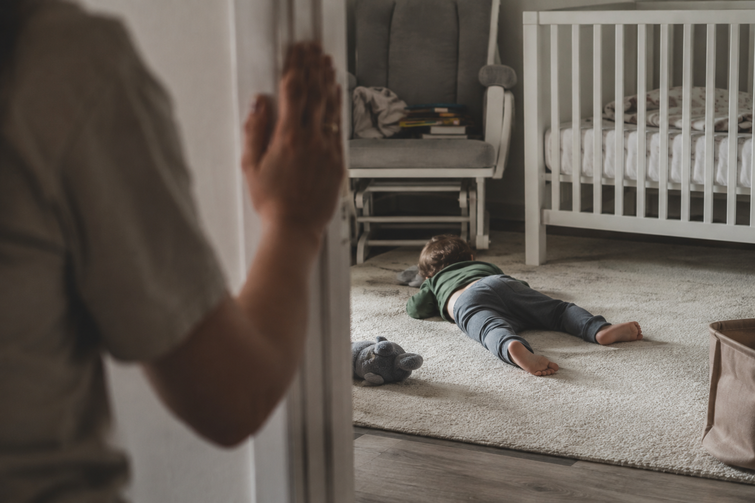 Toddler resisting naptime in bedroom