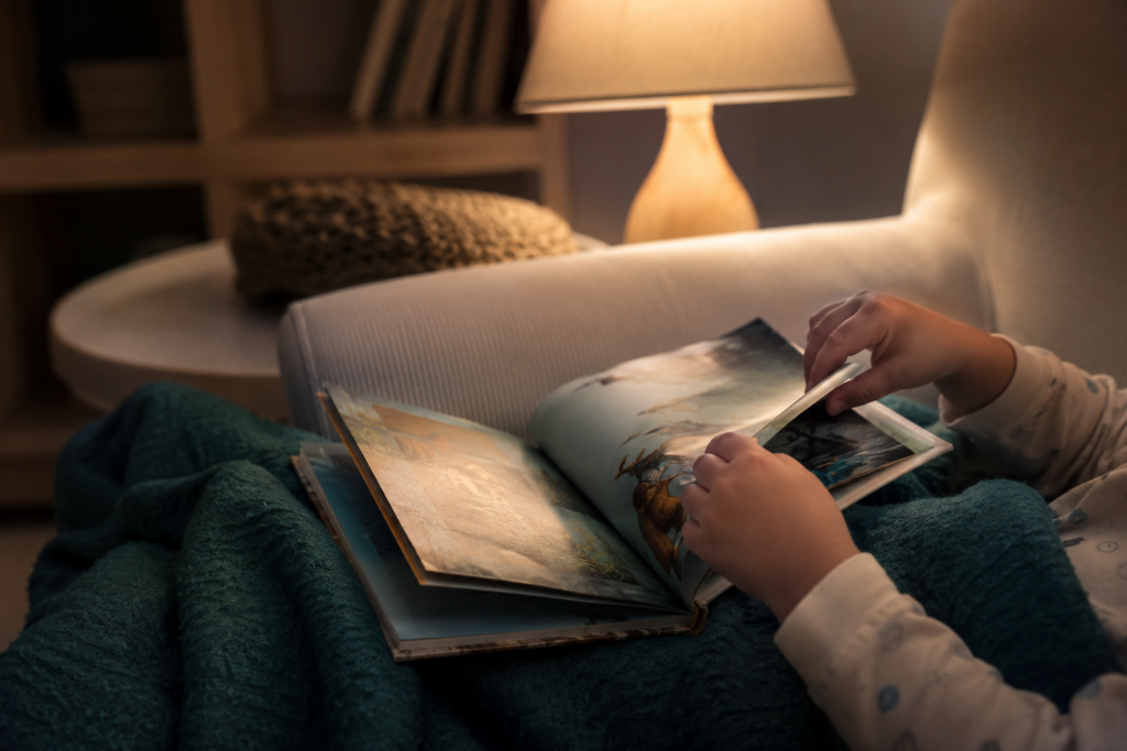 Calm toddler evening routine with books in soft dim light